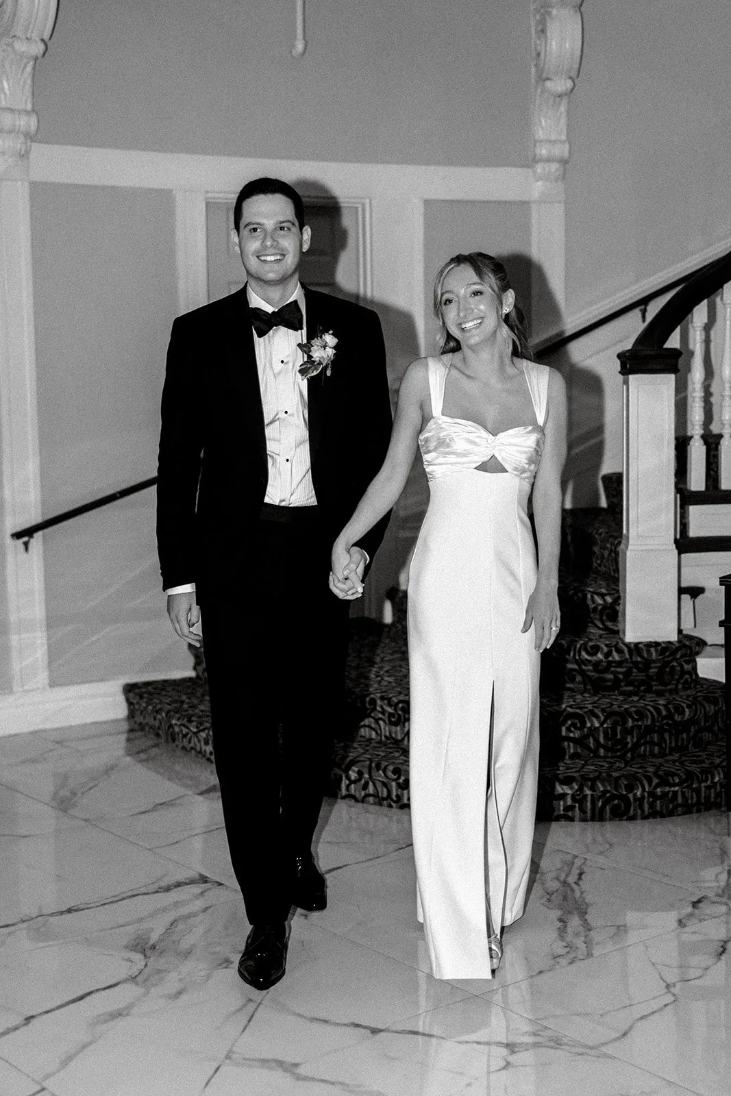 Bride and groom making their grand entrance into the reception during their jewish wedding in New York