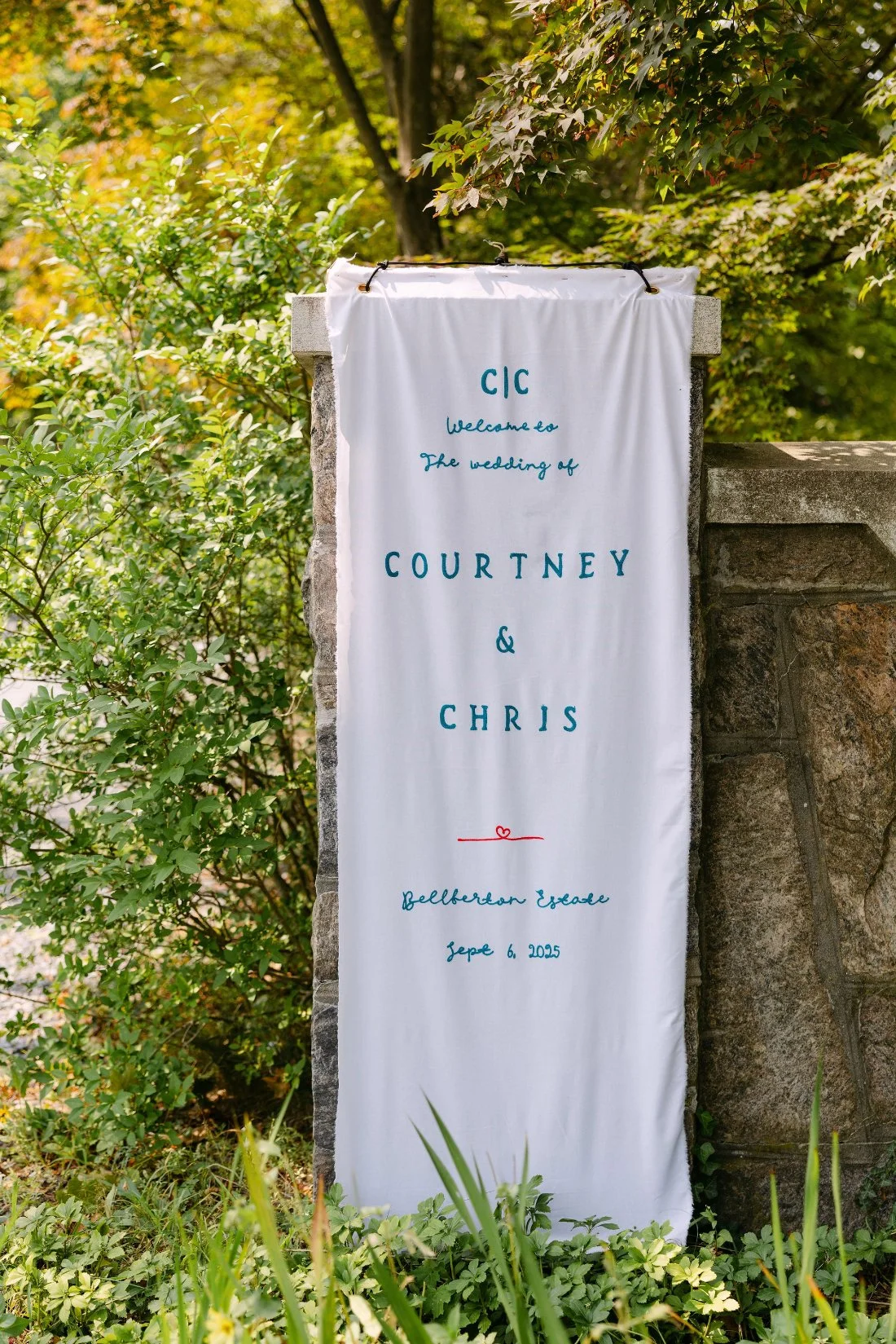 Custom wedding welcome banner for Courtney and Chris at Bellberton Estate for outdoor wedding in New York