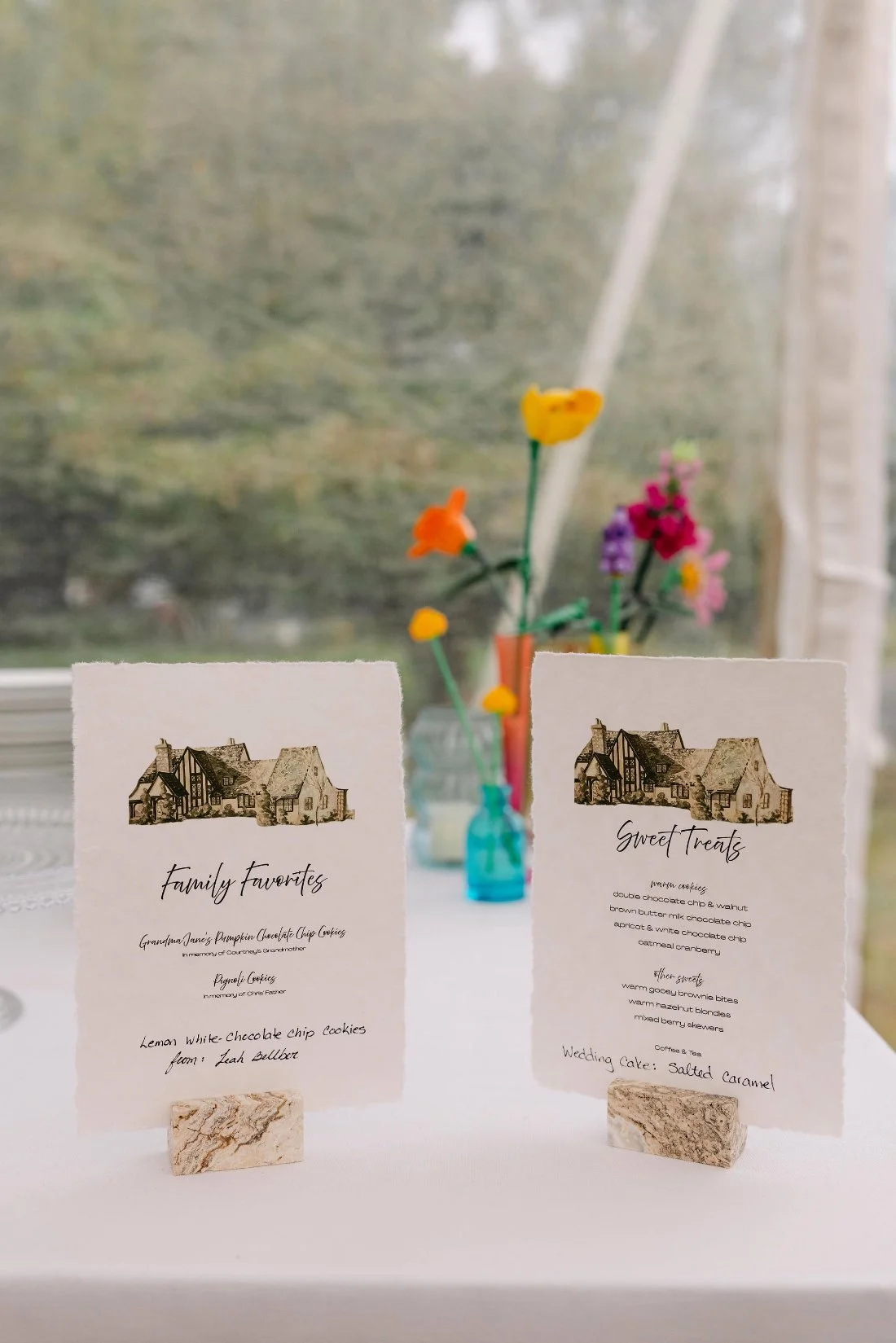 Custom dessert signs for family-favorite cookies and sweets at outdoor wedding in New York