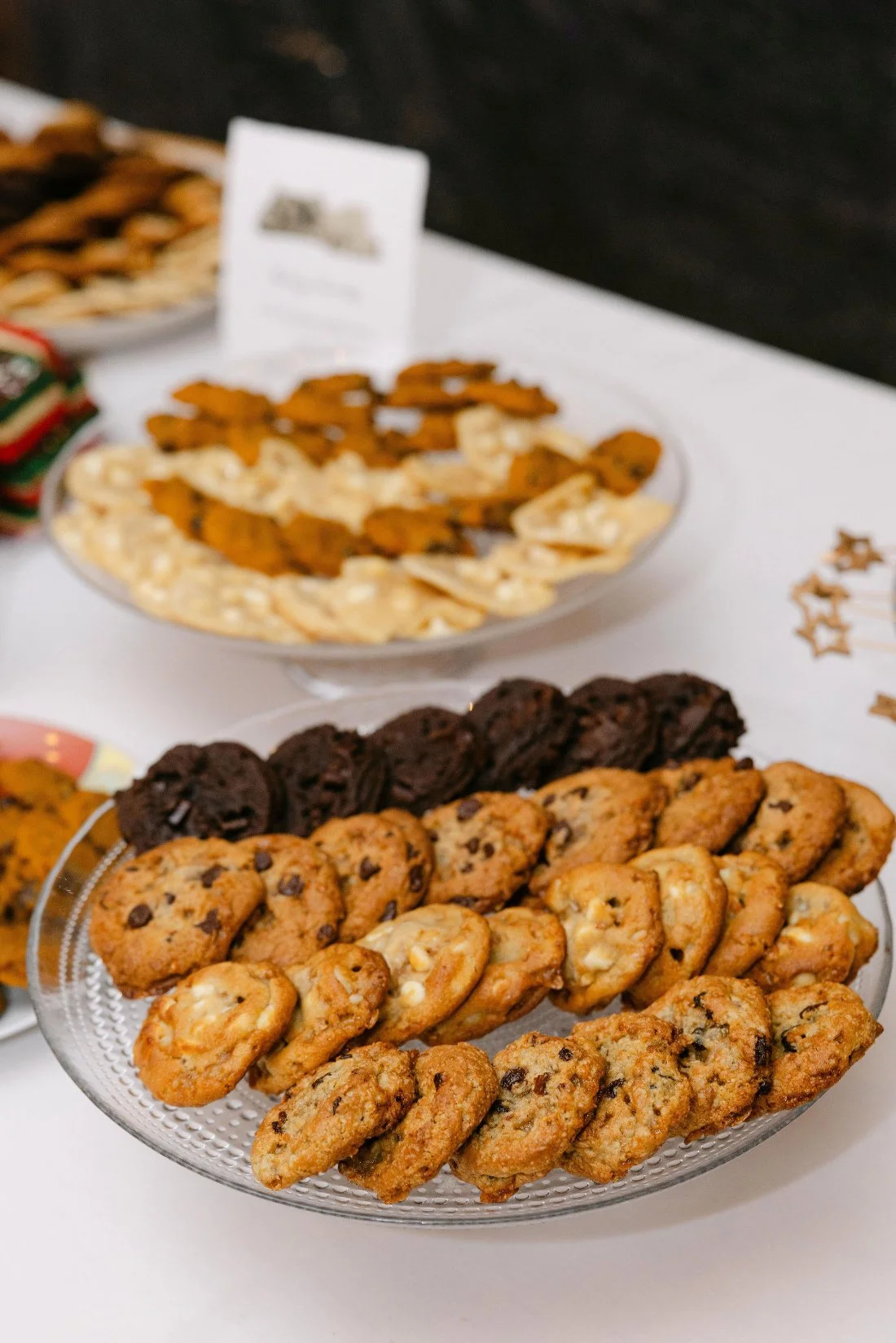 Eclectic dessert table filled with sweet treats at an outdoor wedding in New York