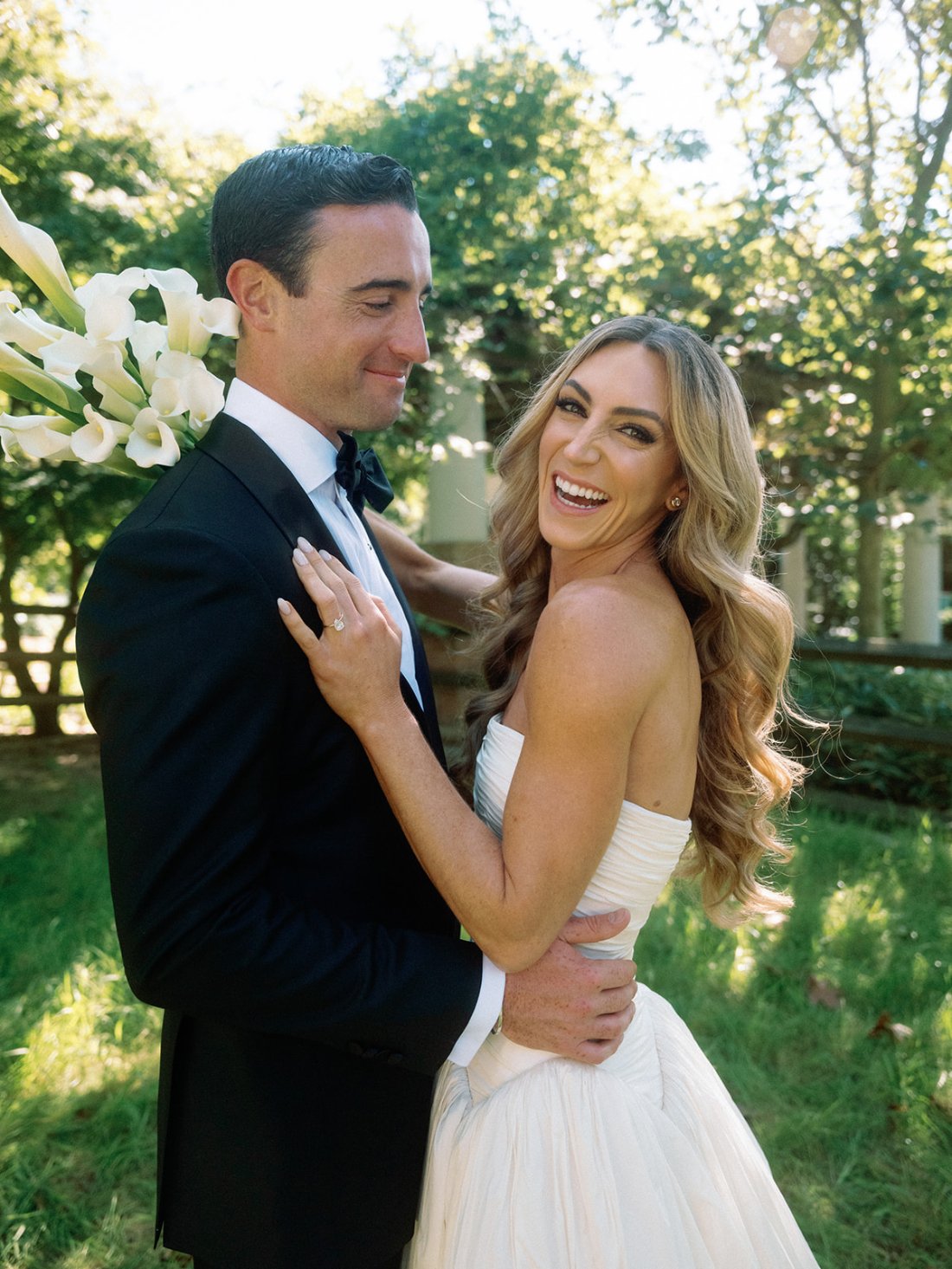 Bride and groom smiling together after their emotional first look in Water Mill.