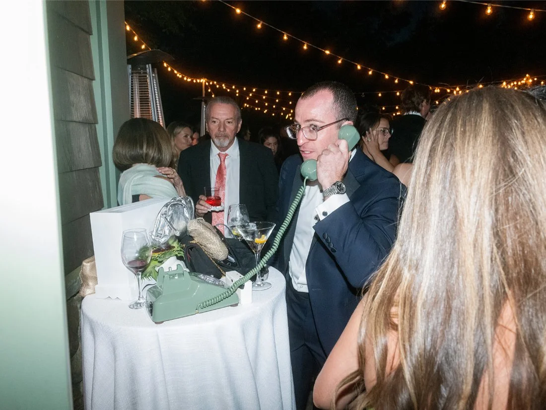 Guests leaving heartfelt voicemail messages for the bride and groom at their Hamptons wedding.