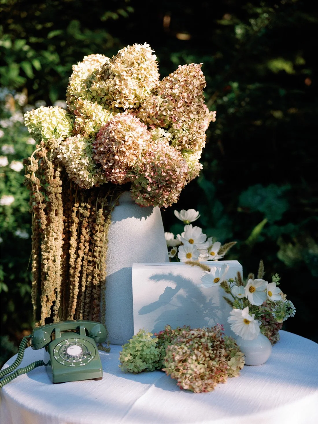 Close-up of hydrangeas and floral décor styled for an intimate Hamptons wedding celebration.