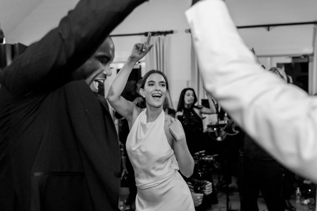 Bride partying with guests on the dance floor at Peconic Bay Yacht Club