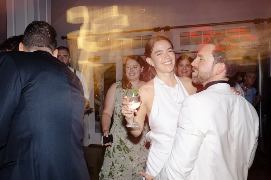 Guests partying on the dance floor during Peconic Bay Yacht Club wedding reception