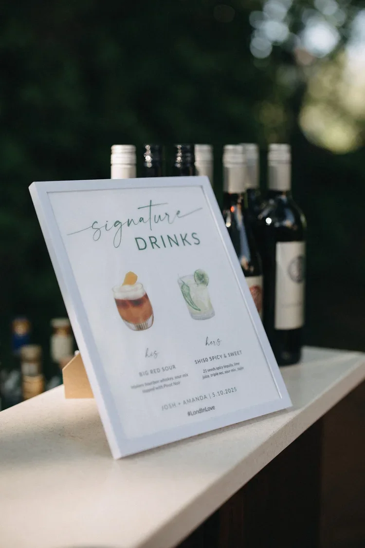 Signature drinks sign displayed at bar to improve the wedding guest experience with clear options