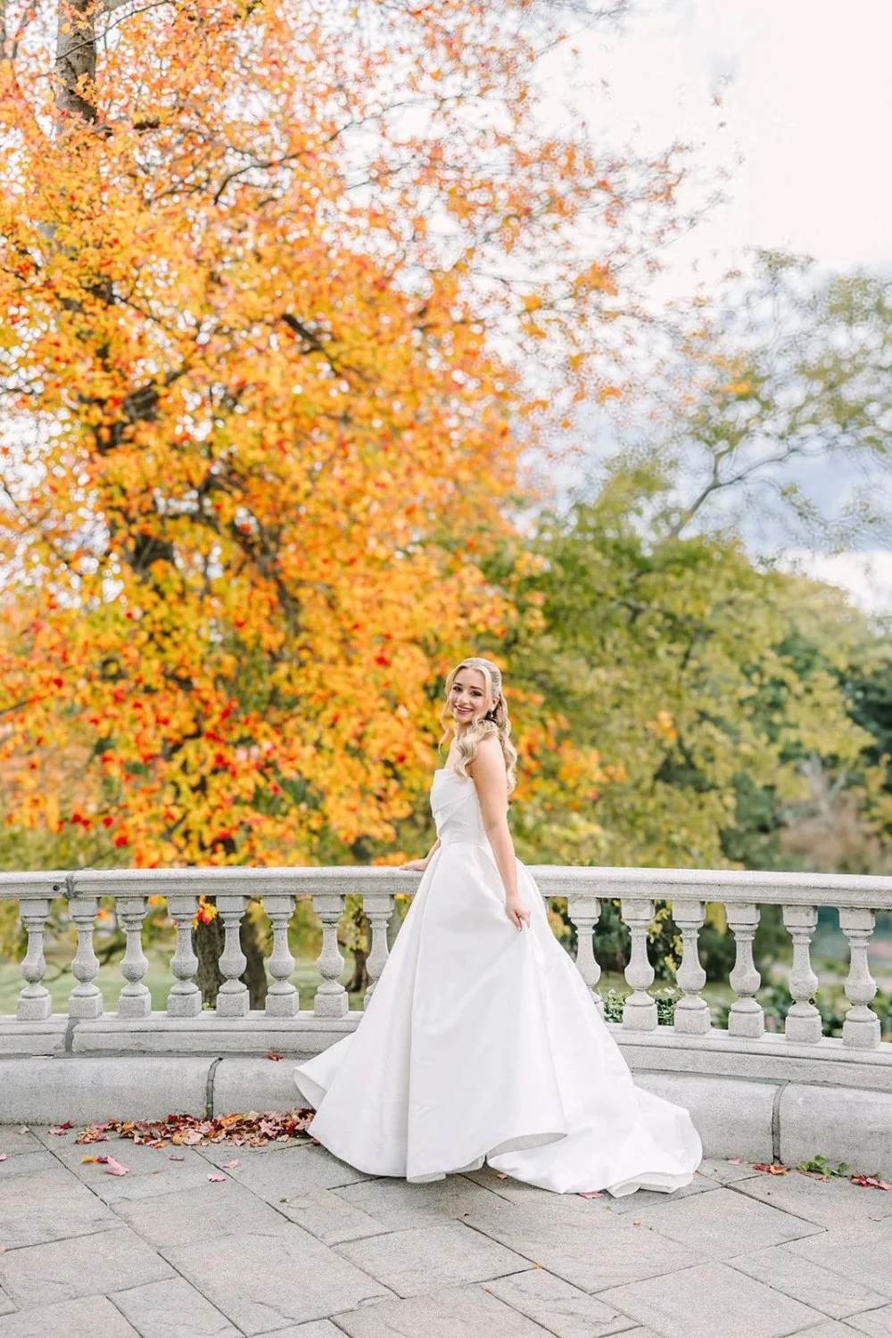 Bride portrait with colorful fall foliage at a Tarrytown House Estate wedding