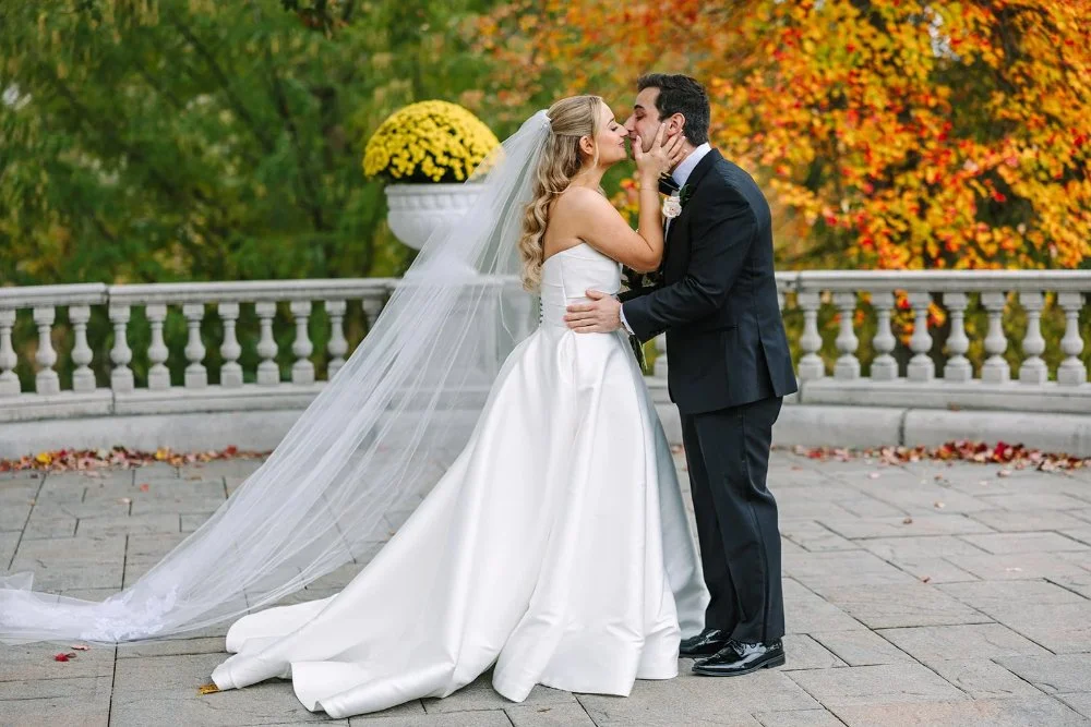 Bride and groom kissing during first look at a Tarrytown House Estate wedding