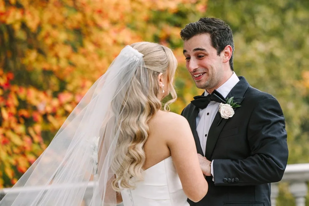 Groom smiling during first look moment at a Tarrytown House Estate wedding
