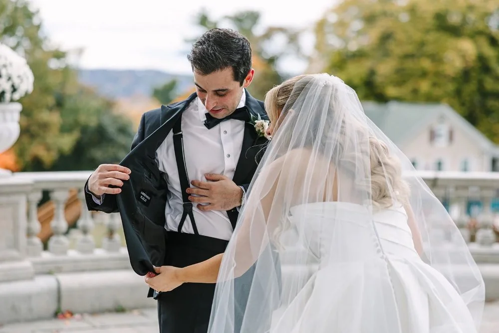 Bride and groom sharing a candid moment outdoors at a Tarrytown House Estate wedding