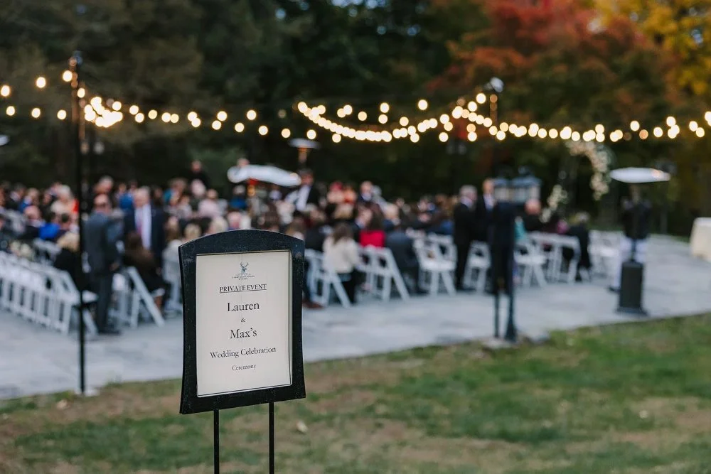 Outdoor ceremony setup with string lights for a romantic Tarrytown NY outdoor wedding
