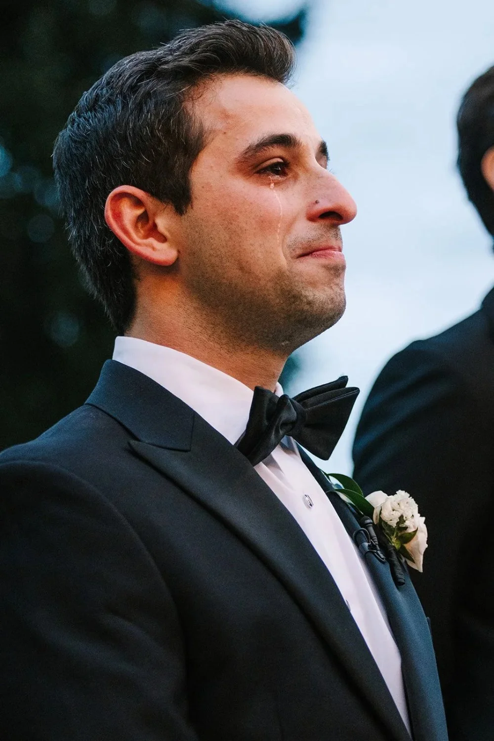 Groom tearing up during heartfelt ceremony moment