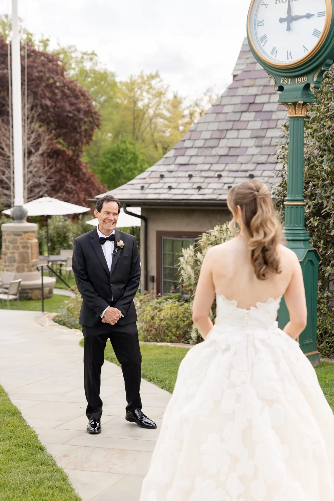 Bride sharing an emotional first look with her father before her Quaker Ridge Golf Club wedding