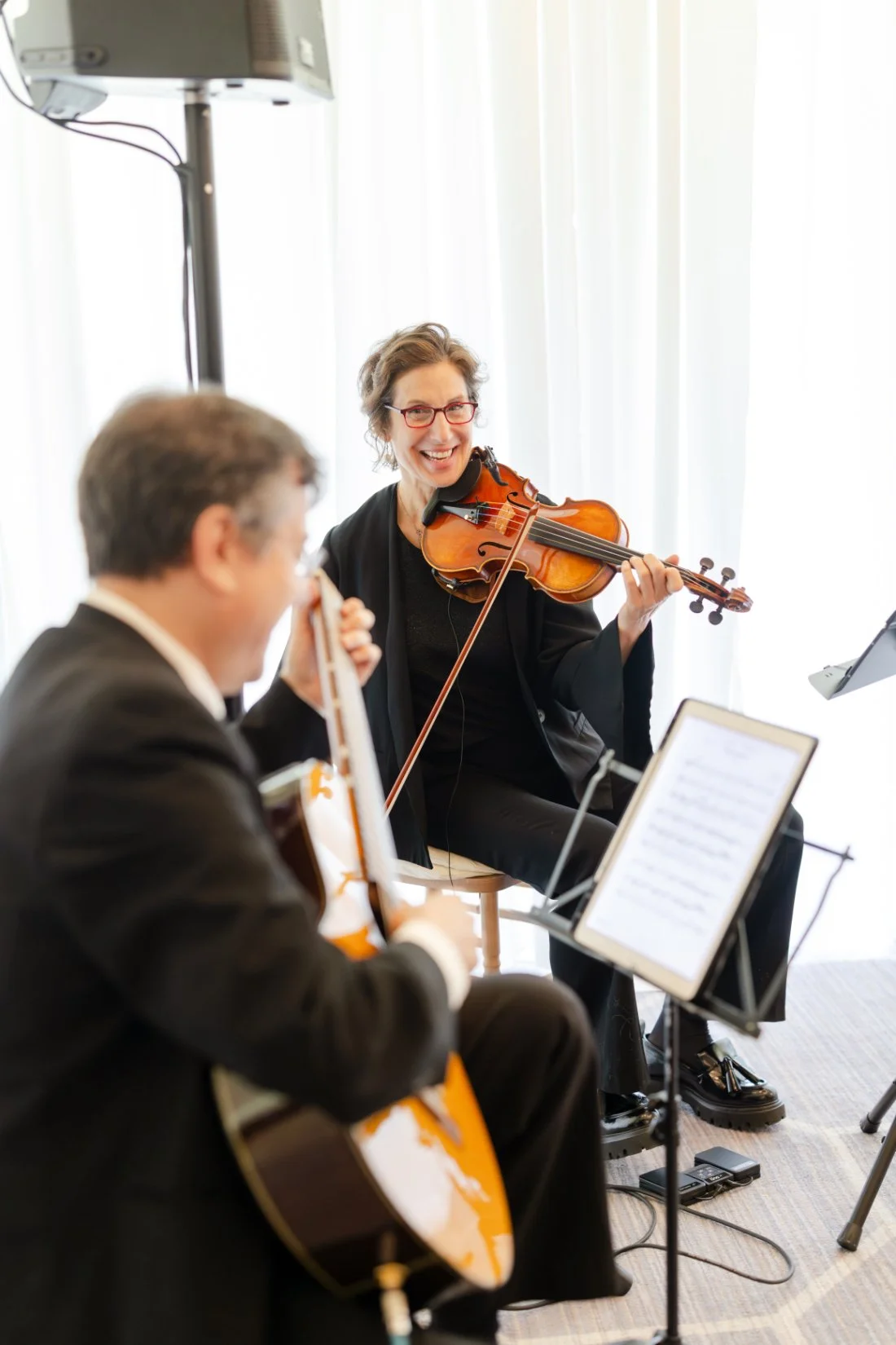 Musicians playing live music for the wedding ceremony entrances.