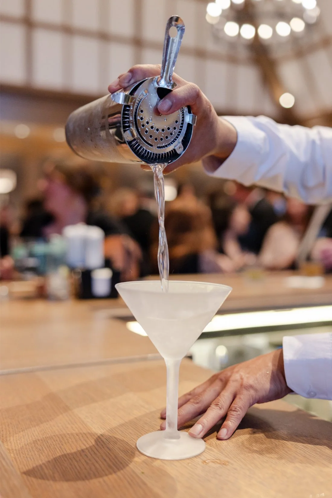 Cocktail being served during a Quaker Ridge Golf Club wedding cocktail hour.