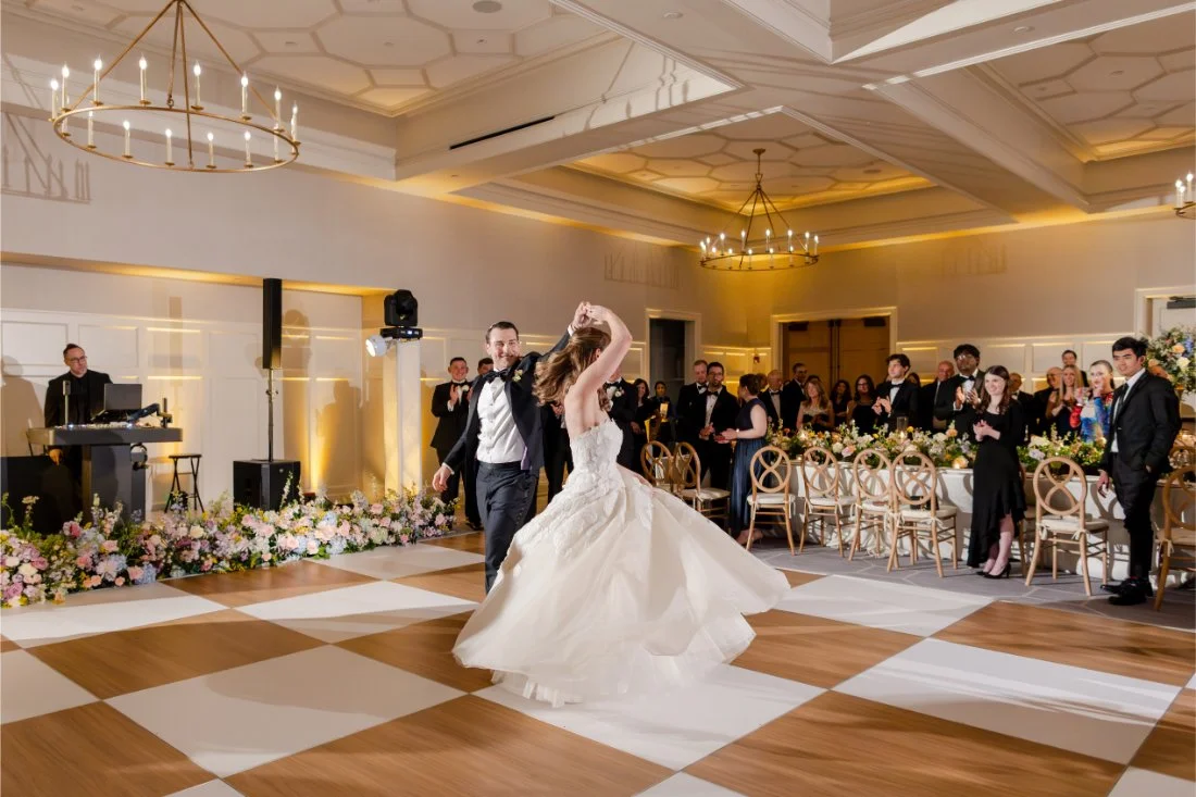Bride and groom dancing together at their Quaker Ridge Golf Club wedding reception.