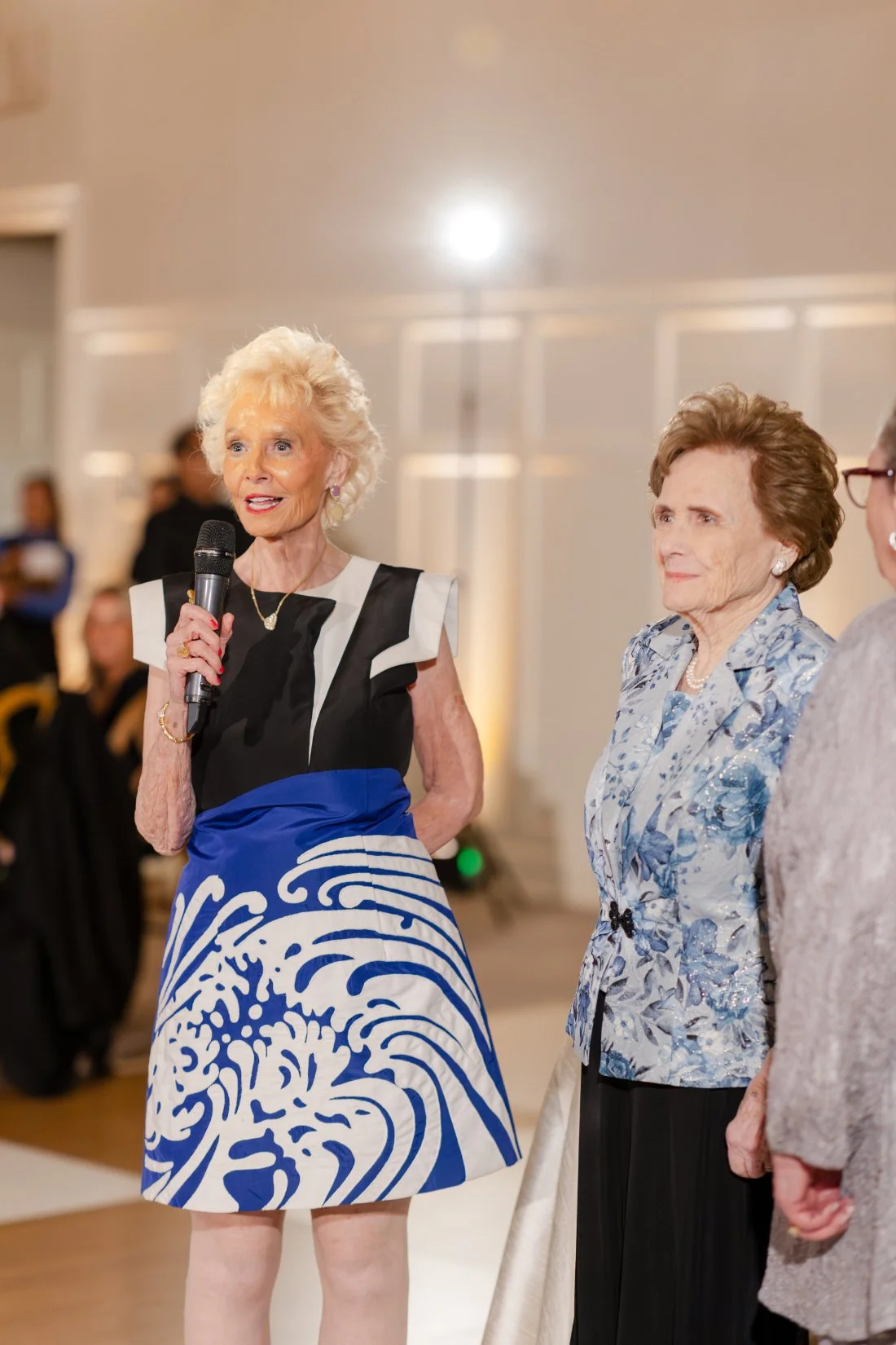 Guest giving a heartfelt speech during the Quaker Ridge Golf Club wedding reception.