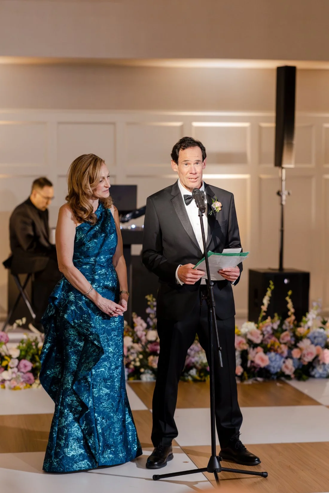 Guest sharing a speech at Amanda and Ethan’s Quaker Ridge Golf Club wedding.