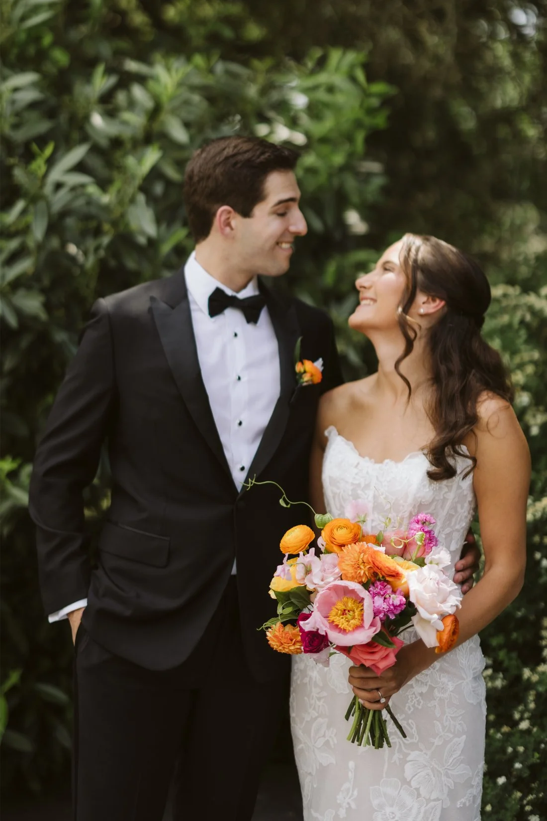 bride and groom look at each other on their wedding day at Tappan Hill Mansion wedding