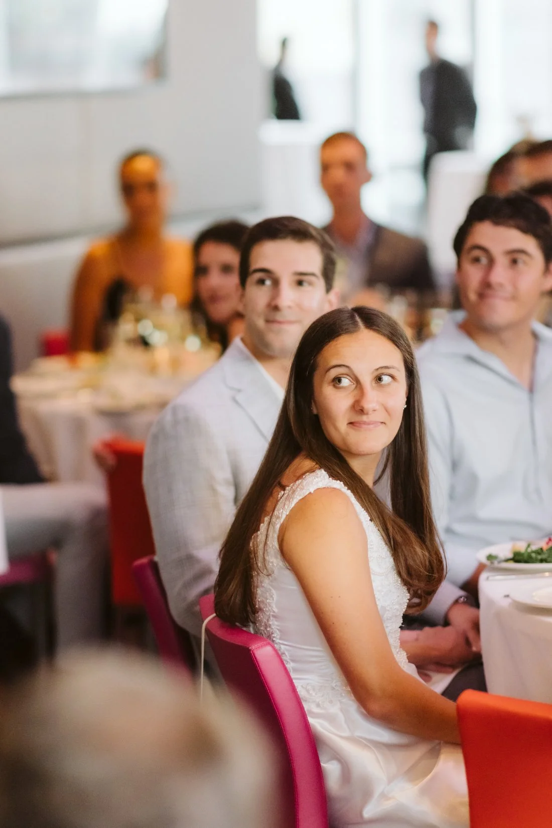 bride listens to rehearsal dinner speech