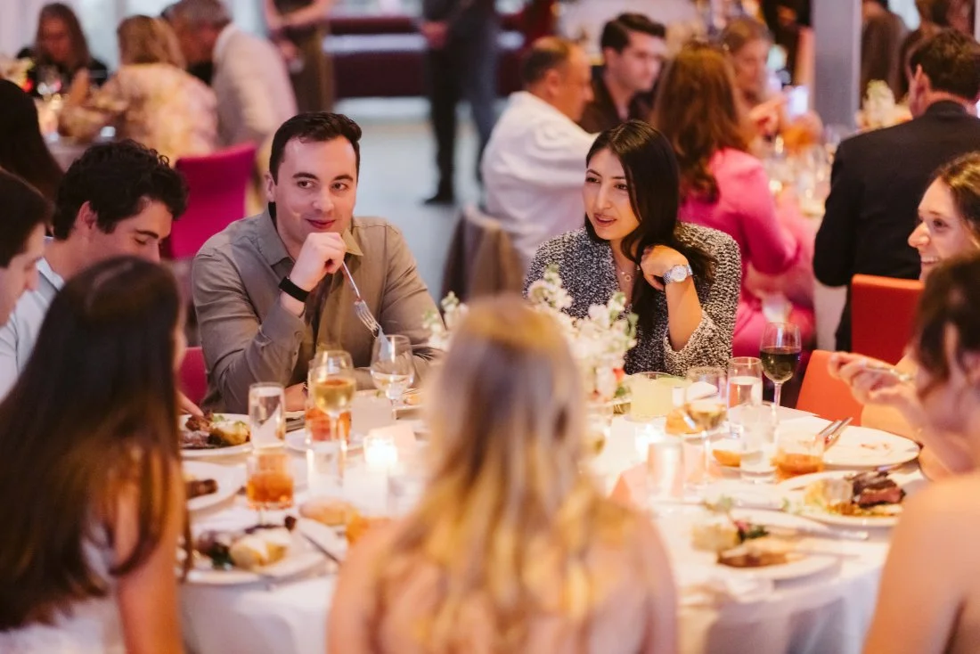 guests enjoying a meal at Robert 