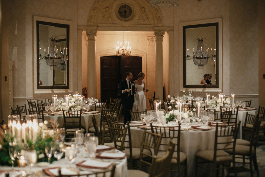 bride and groom looking at their beautiful venue space
