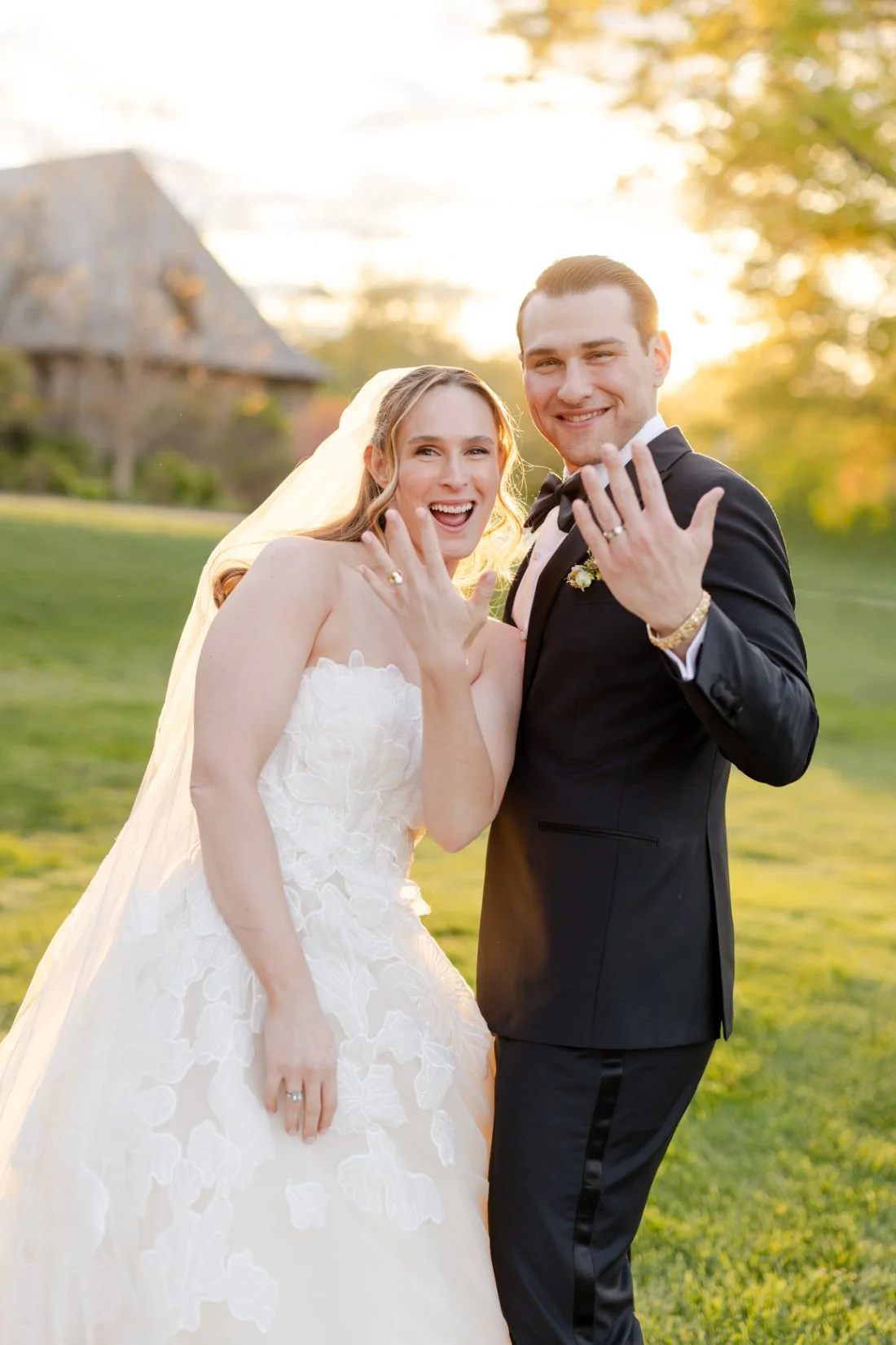 Newlyweds sharing a romantic moment together during golden hour.