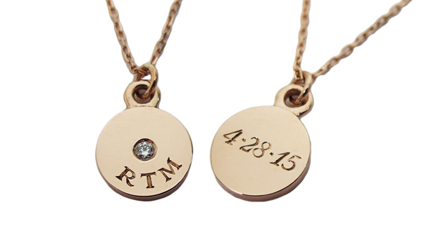 14k Rose Gold Push Present with Hand Engraving of Baby’s Initials and Birthdate. Also included the baby’s birthstone, a flush set white diamond.