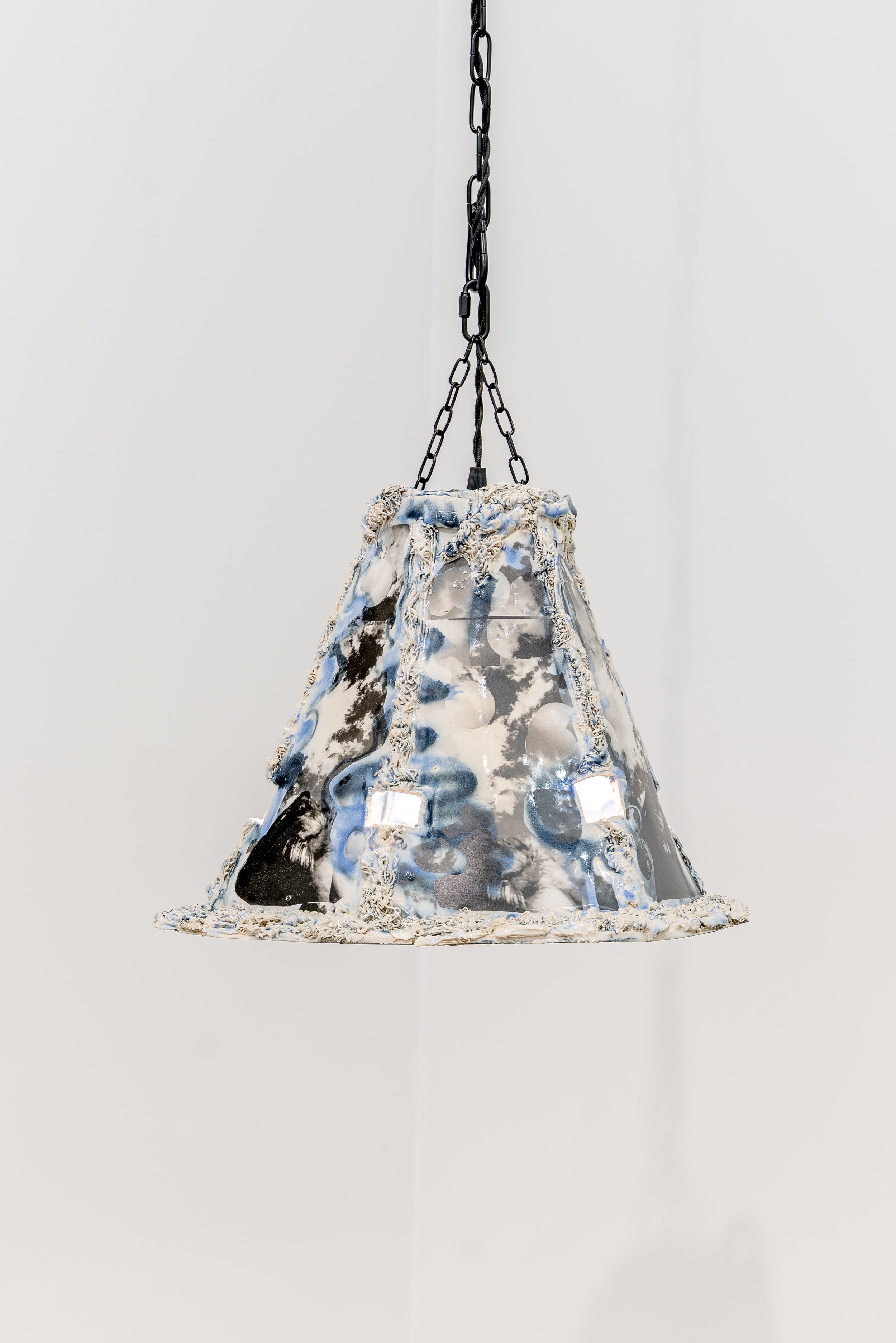 Hair Sky Light
Glazed ceramic, photographs, light, chain
15 ¼” x 13 ½” (pendant)
2026
