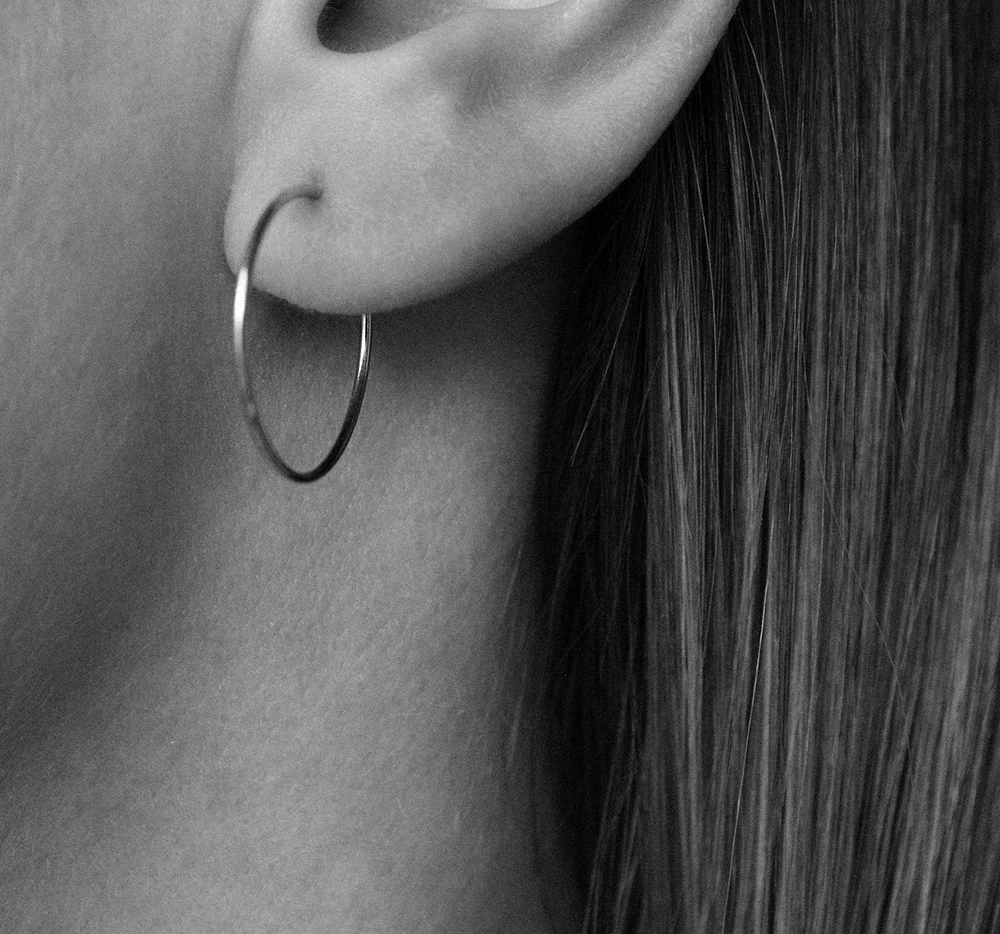 Infinity hoop in ear bw.jpg
