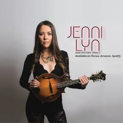 #29 - Jenni Lyn Gardner Jenni Lyn Gardner joins the podcast and tells us about her upcoming project, playing with Della Mae and traveling the world over. She shares some of her experiences through being involved with the American Music Abroad program, and her memory of meeting Bill Monroe. This episode is brought to you by Lowe Vintage Instrument Company. Find your timeless tone at lowevintage.com . September 13, 2016