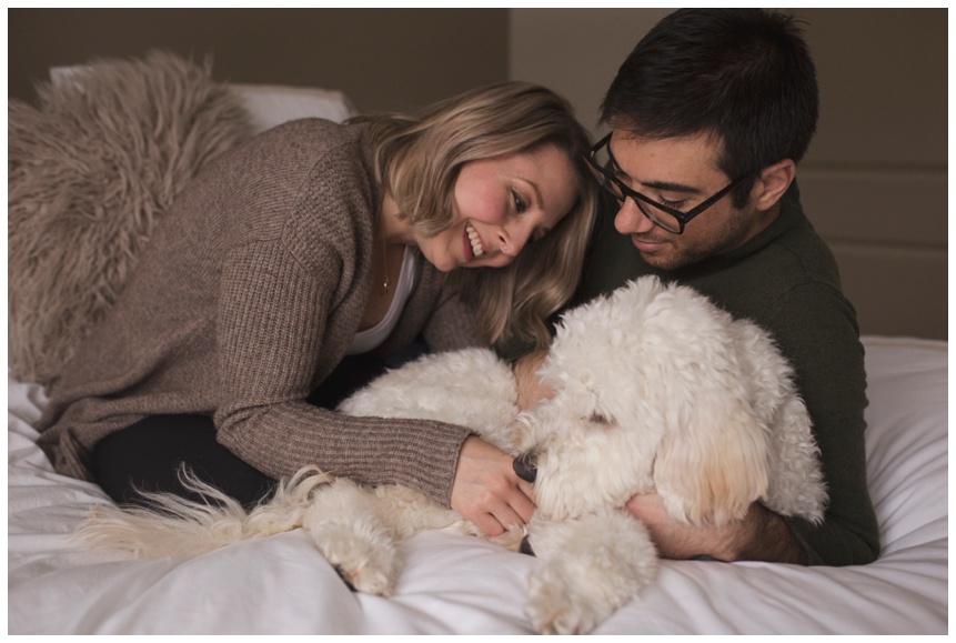Oneonta NY Maternity Photographer in home session snuggling with dog