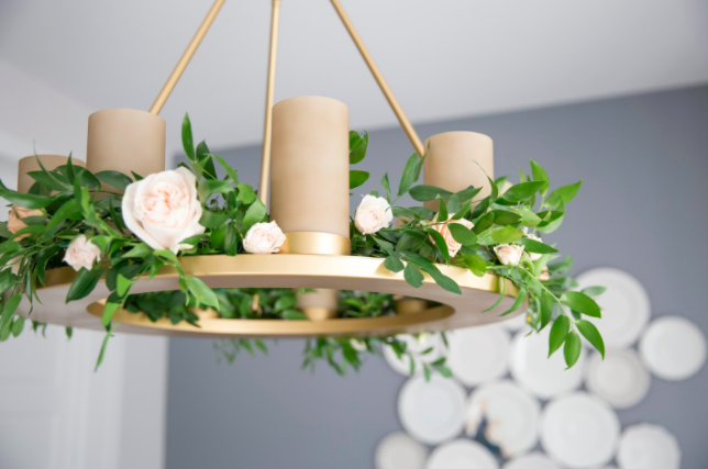 We love helping Krystin Lee from Suburban-faux-pas with any of her dinner party needs. With finicky weather, she decided it would be best to host inside. With florals hanging from the chandelier and garland runner for the table, we really did bring the outside, inside. We also incorporated the Stella Artois Chalice into our décor by adding tea lights for some mood lighting come dusk. In an effort to personalize place settings for guests, we hand-stamped custom name cards affixed to a rose and attached them to linen napkins. 