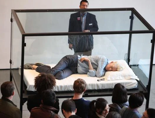 Actress Tilda Swinton sleeps in a glass box as part of The Maybe installation at NYC's MoMA in 2013. Art? Perhaps. Or maybe she just really needed some shut eye!!!