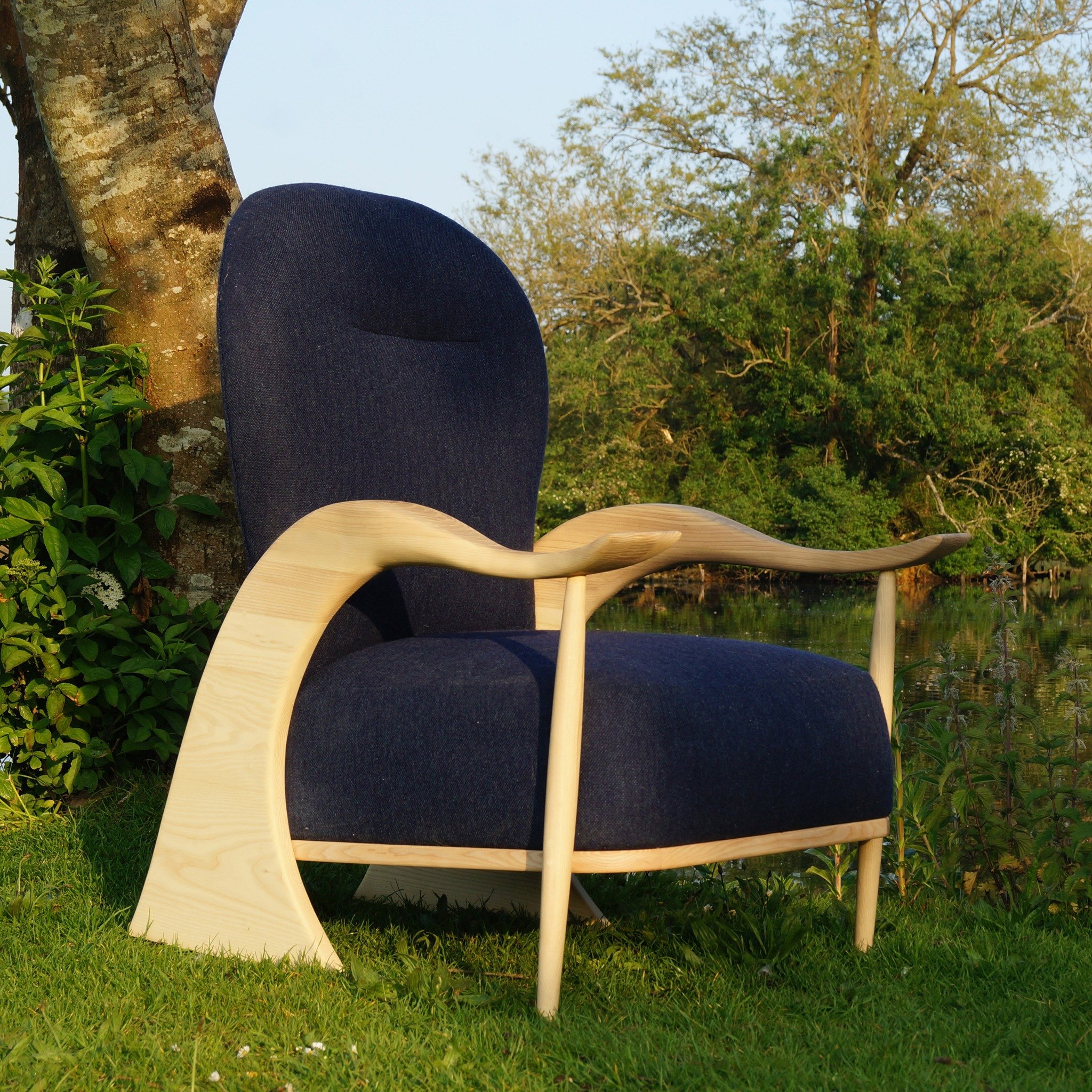 Check out my new Flow Lounge Chair! 🍃

The tactile carved wood of the sculptural leg-arms resemble the flowing forms found in nature and at the same time ergonomically echo our forearms to balance form and function with nature and cosiness. 

The ha