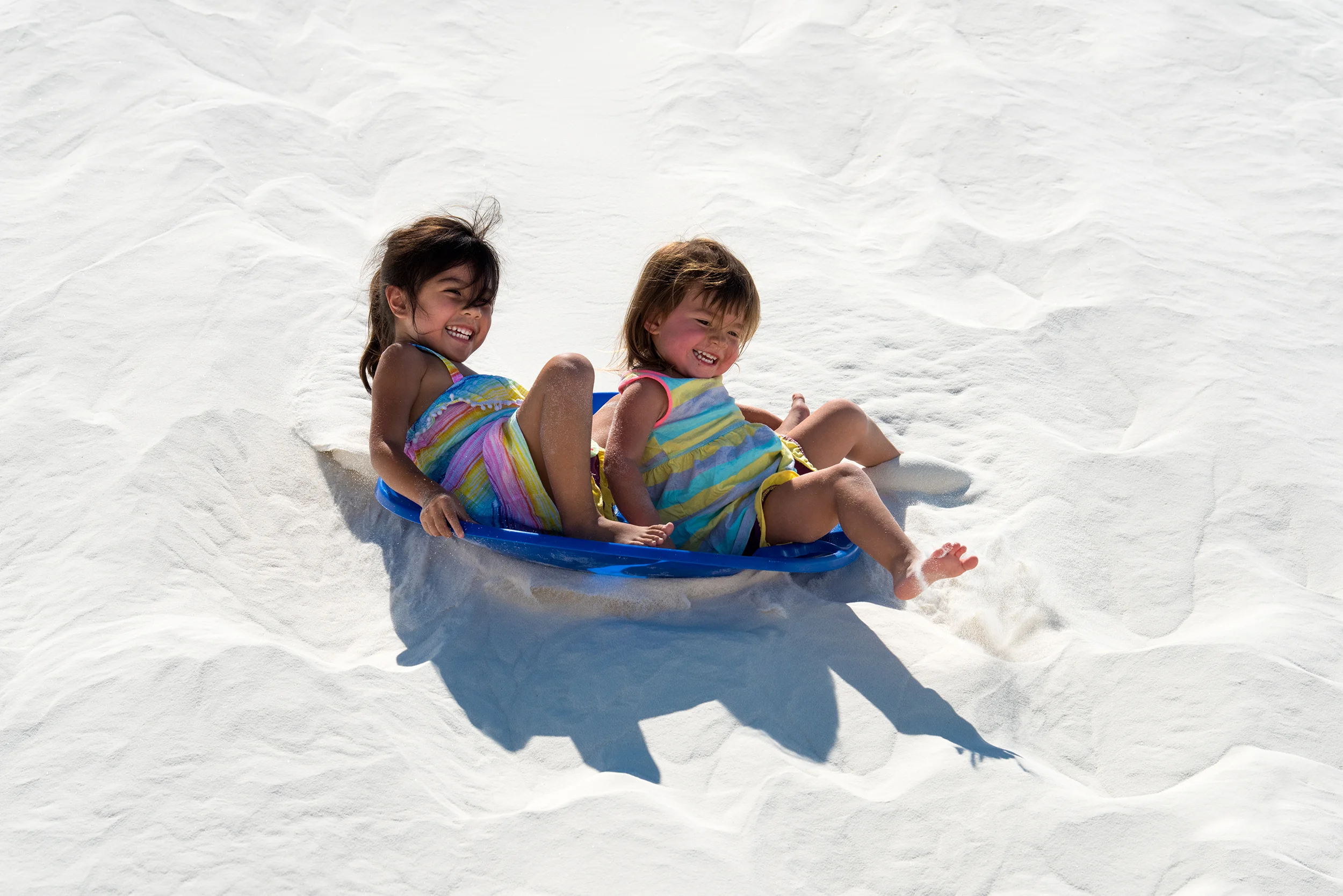 Children Sliding Down the Dunes, Spring, White Sands National Monument , New Mexico