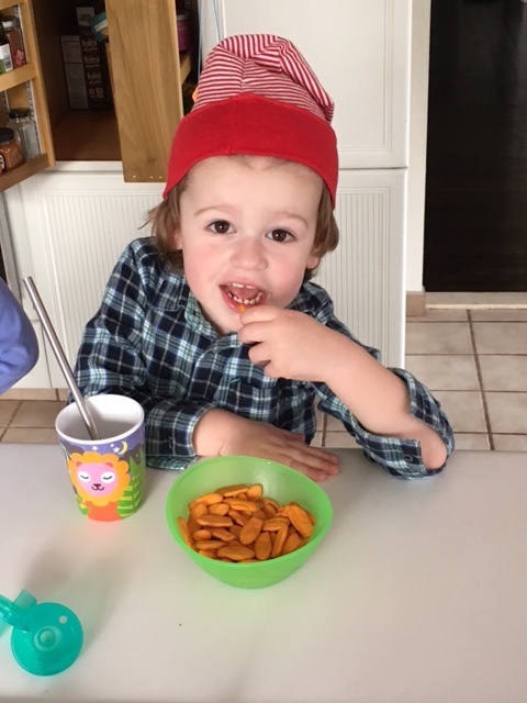 This is a little baby elf hat. He recently insists on wearing it every day. The kid is a little weird, I'm not going to lie.