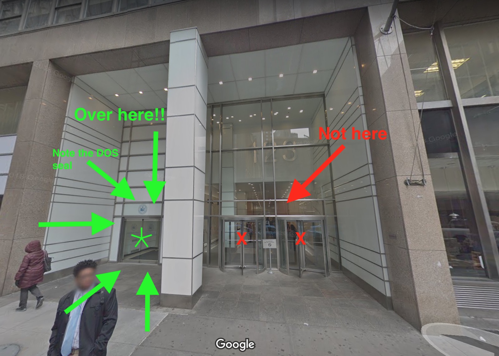 Google Street view image of the entrances to 123 William Street. Head to the entrance on the left with the tiny blue Department of State seal over the entrance.