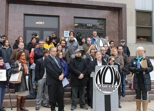 NOW logo at podium 06182021.jpeg