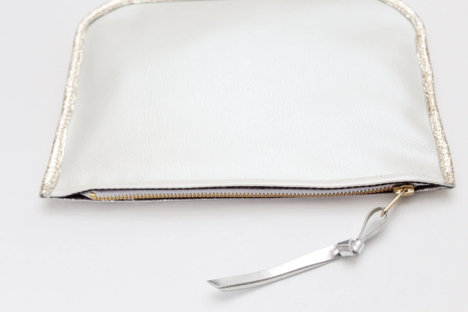 White pearlescent pouch .jpg