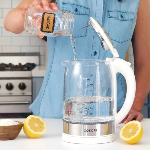 Easily Descaled To descale your kettle, simply fill it with vinegar and water, boil it, and let it soak for 2 hours. Then wipe away the scale with a cloth.