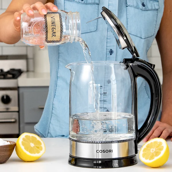 Easily Descaled To descale your kettle, simply fill it with vinegar and water, boil it, and let it soak for 2 hours. Then wipe away the scale with a cloth.