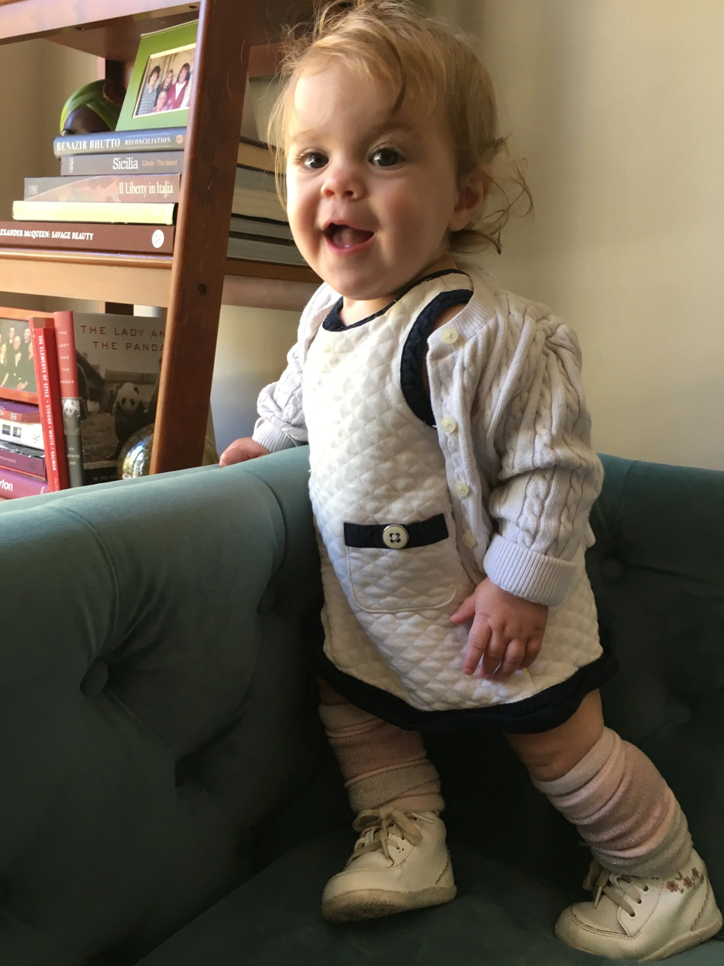 Pantsuit legacy (When you have thigh rolls like these, you don't cover them up with pants. Millie's wearing suffragette white instead. #legwarmernation)