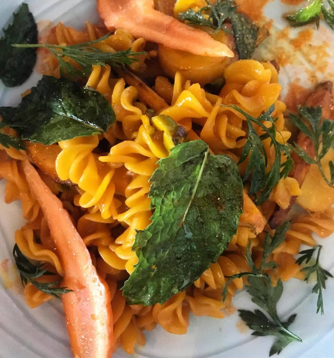 Housemade carrot fusilli pasta with carrot juice, honey, pistachio and mint is just one of Dante's recent menu items featuring local honey from Fruit of Levine. (photo courtesy of Dante)