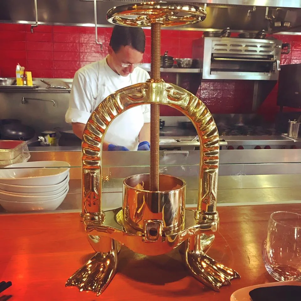 LeRoux’s gold-plated duck press — a rather baroque component of beak-to-tail food prep — was a gift from Xavier LeRoux, one of Chef Lon Symensma’s mentors and the restaurant’s namesake. (photo courtesy of ChoLon)