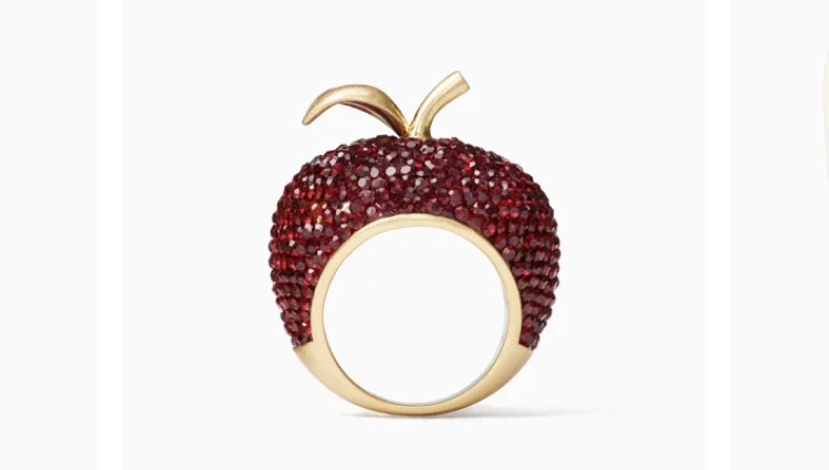What better than a big apple cocktail ring for a girl who was born to have all of New York at her fingertips? Dashing Beauty Apple Ring, $128 at Kate Spade .