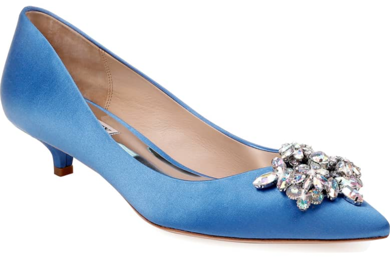 Midge’s power color is any shade of pink, but honestly, she’s never met a rich hue she didn’t love. Vail Embellished Kitten Heel Pump in cerulean satin by Badgley Mischka, $130 at Nordstrom .