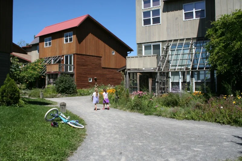 Eco-Village-Children-plus-bike-800x533.jpg