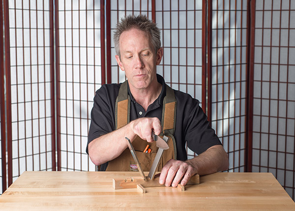 Using diamond lapping plates in a homemade jig to hold them at the proper angle.