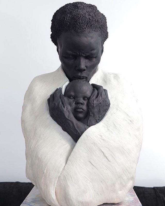 Protector of the Next Generation; by @chukesart &ldquo;I have received a great deal of response from those who have viewed this sculpture. Most people think this is a lovely women holding her baby, but this is a loving man who understands the importa